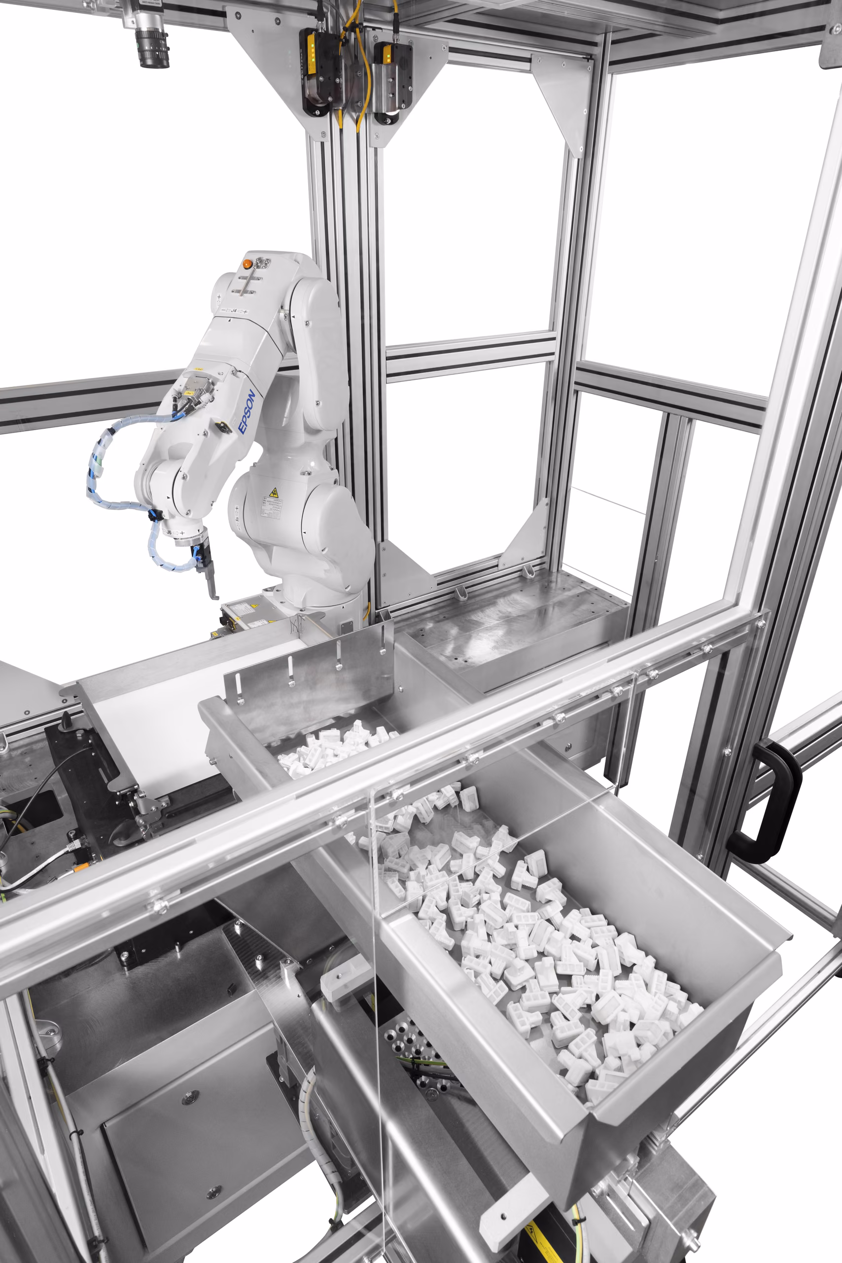 Roboterzelle mit Schaltschrank, Bedienpanel und eingehauster Handhabung